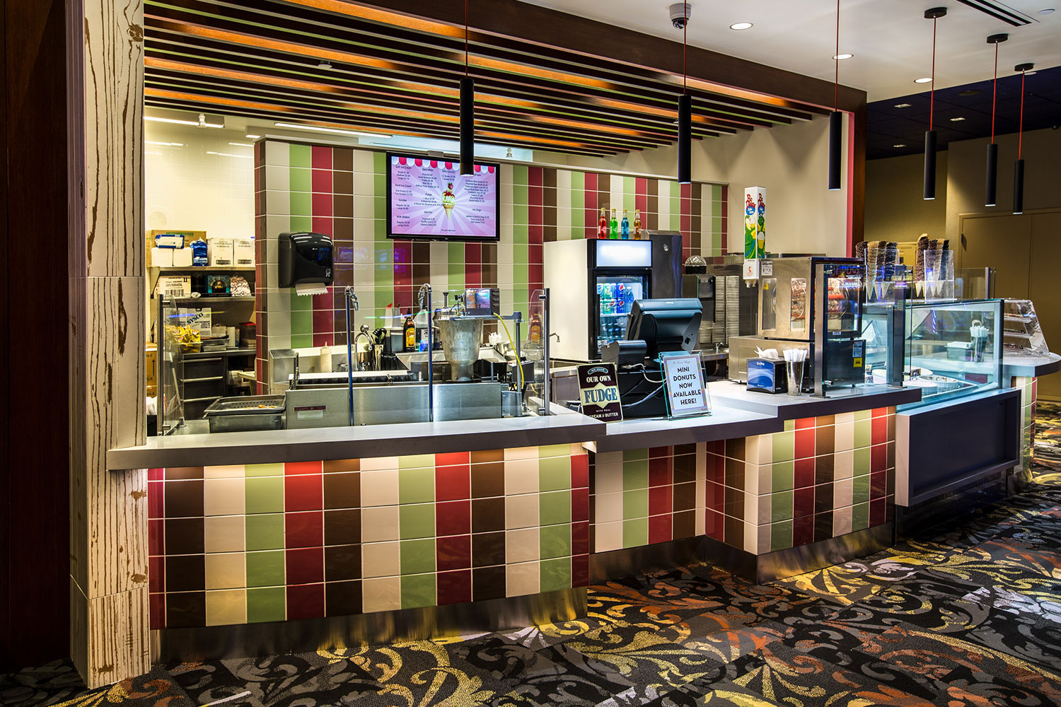 Ice Cream Shoppe serving station with tiled front and cash register at Club Regent Casino