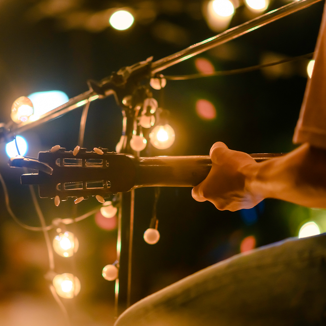 Person playing the guitar - Loft180 Special Events Feature pic